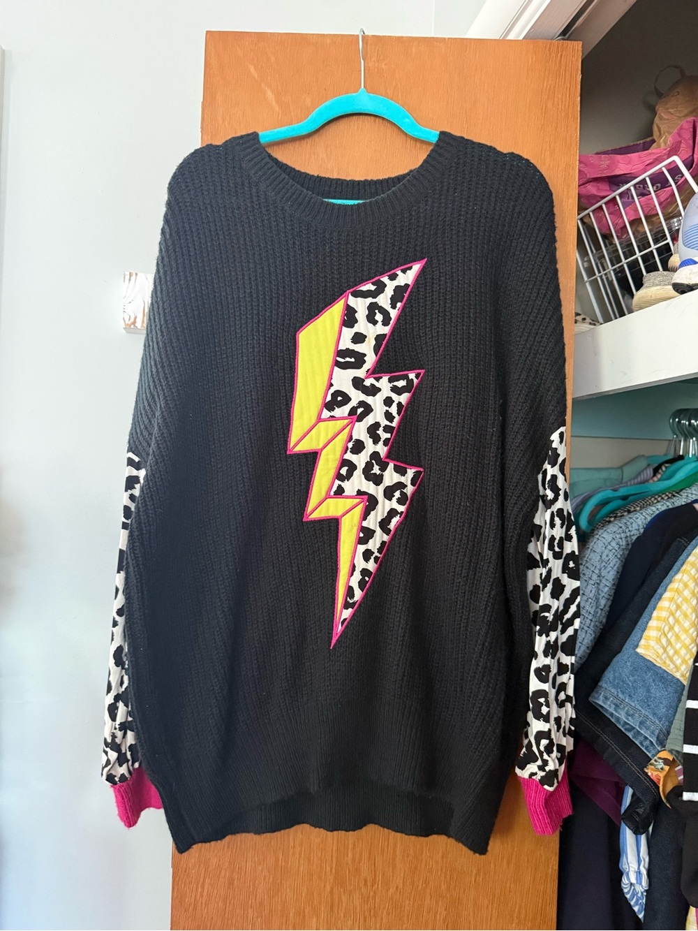 Black Knit Sweater with Leopard Lightning Accent
